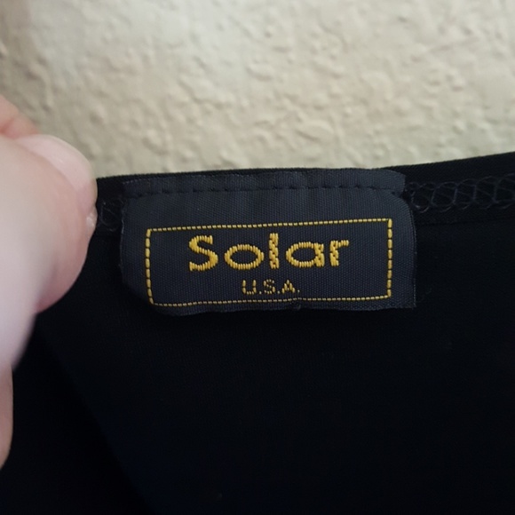 Sleeveless  black top. - Picture 3 of 3